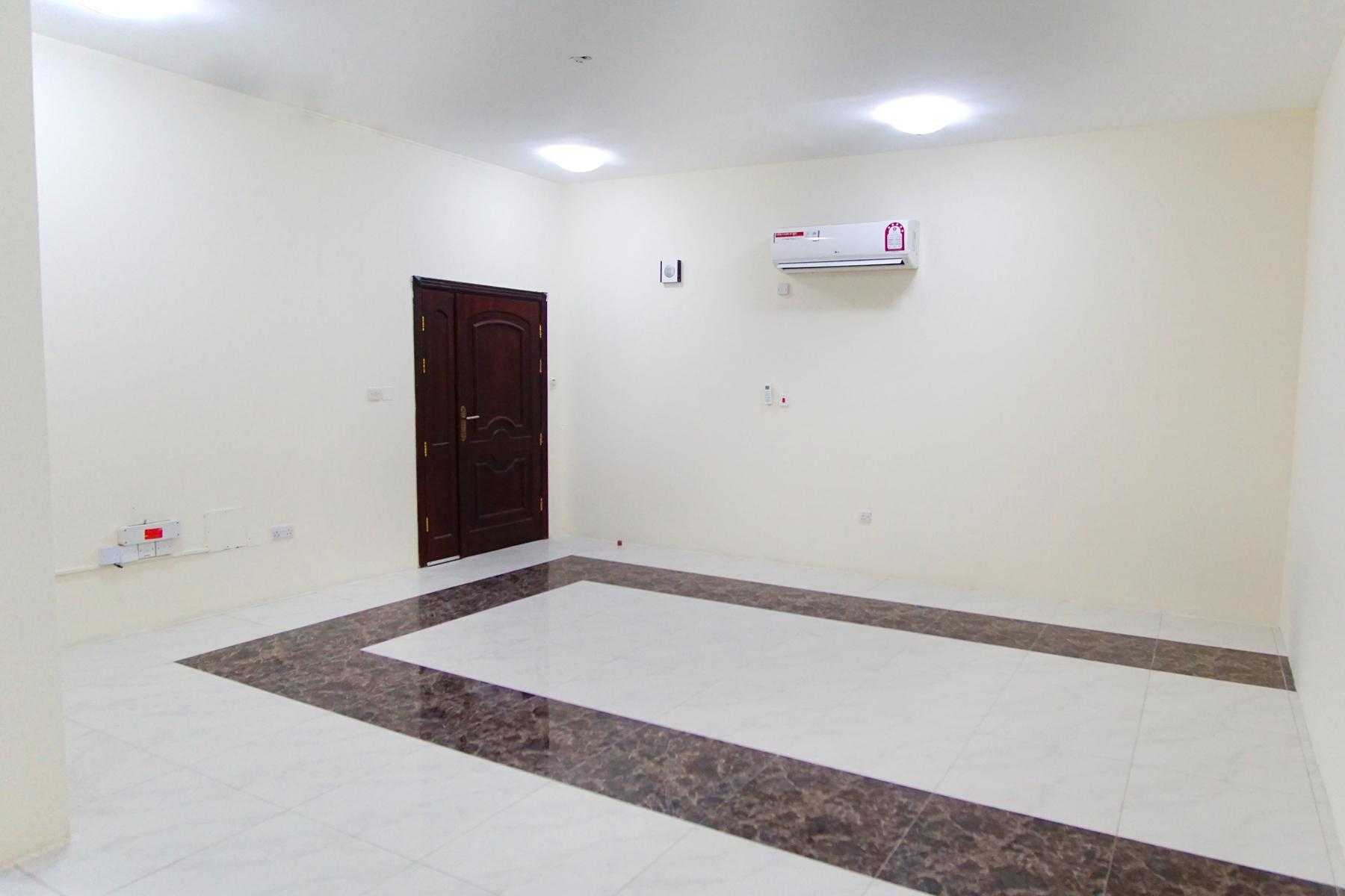 Condominium in Mu`aydhir Rawdat Rashid, Ar Rayyan 12636591