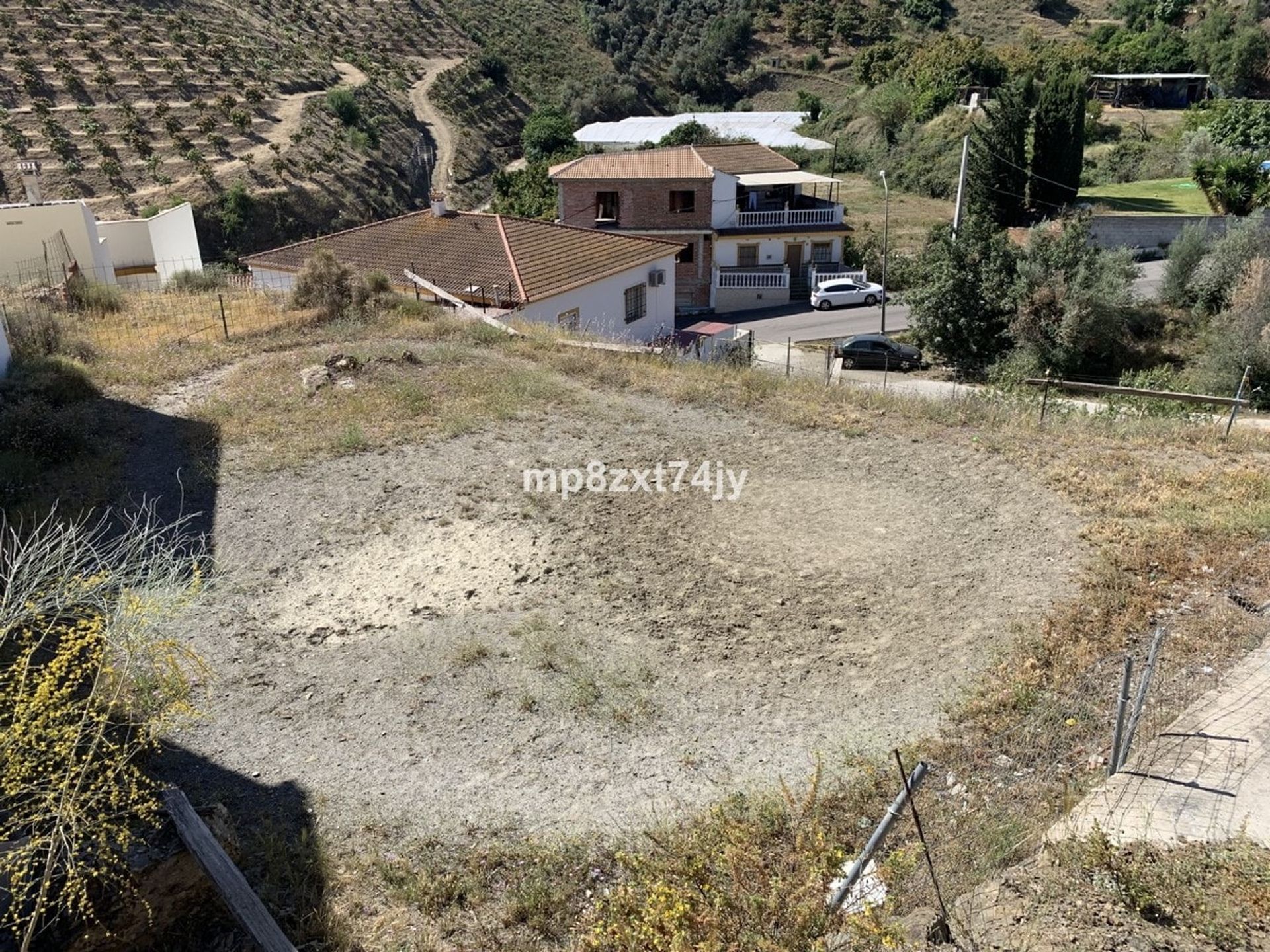 土地 在 Benamocarra, Andalucía 11234300