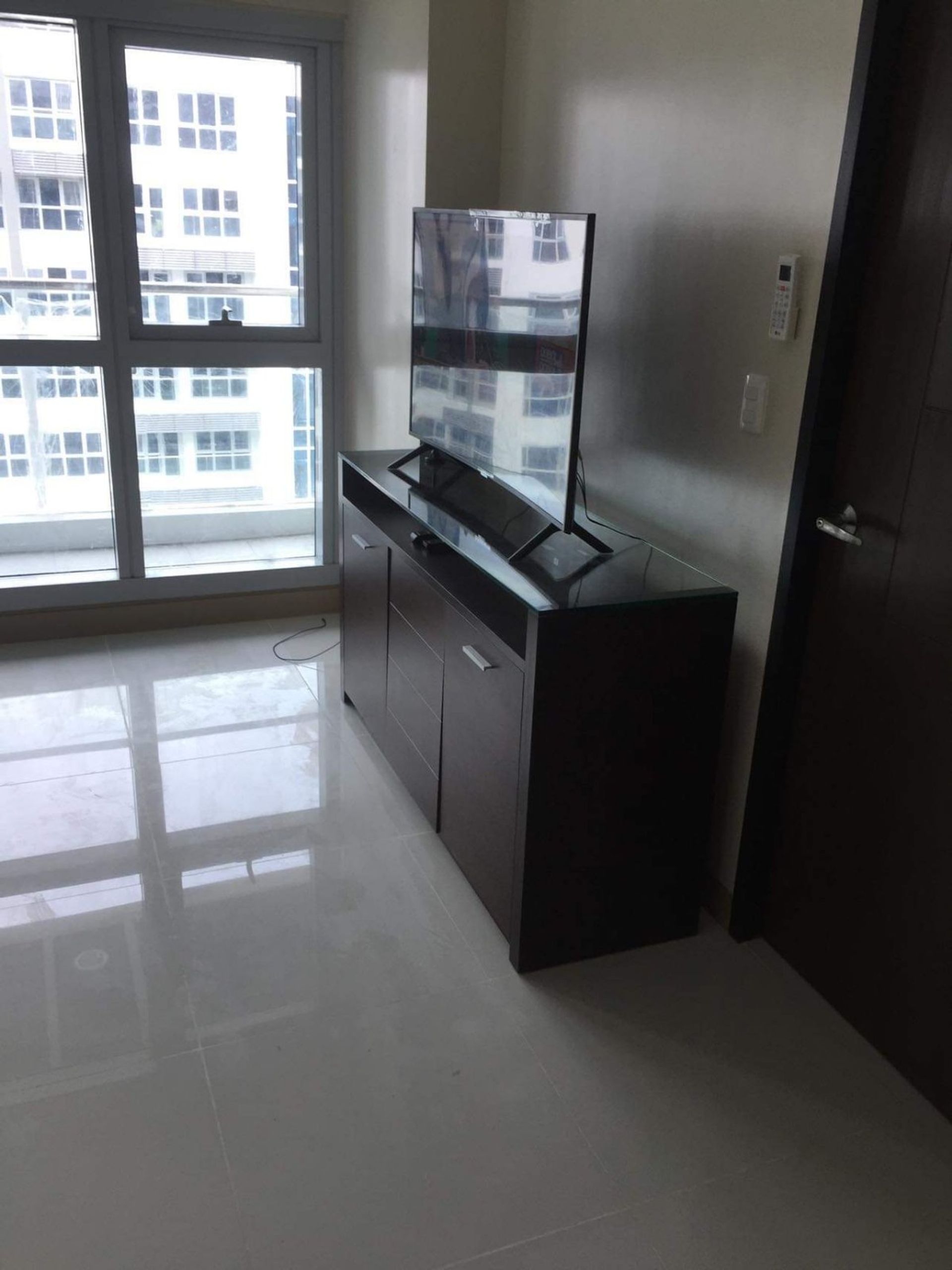 Condominium dans Ville mondiale d’Asie, Paranaque 12297076